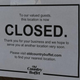 closed sign on old country buffet door